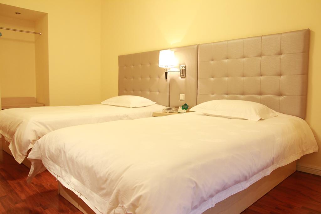 Qingdao Renjia Bussiness Hotel الغرفة الصورة